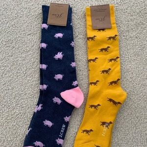 Never worn pair of critter socks! You get both!